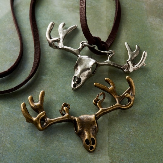12 Packs: 2 ct. (24 total) Found Objects™ Oxidized Brass & Silver Elk Charms by Bead Landing™